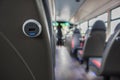 Inside interior of modern bus showing free USB charging port on back of seat