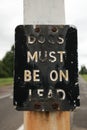 Dogs Must Be On Lead retro rusted sign