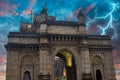 The Gateway of India Under a Dramatic Sky with Sparkling Lightning in the Background Royalty Free Stock Photo