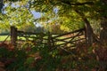 Gateway to autumn. Old wooden gates. Royalty Free Stock Photo