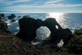 Gatklettur, natural arch rock in the cliff of Arnarstapi, Snaefellsnes peninsula Iceland