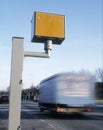 Gatso speed camera with speeding vehicle Royalty Free Stock Photo