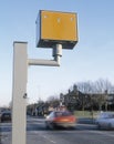 Gatso speed camera with speeding vehicles Royalty Free Stock Photo
