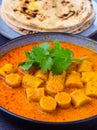 Gatte ki kadhi served with roti