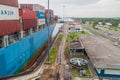 GATUN, PANAMA - MAY 29, 2016: Container ship is passing through Gatun Locks, part of Panama Can Royalty Free Stock Photo