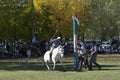 Gaucho cowboy Vaquero at a rodeo riding a horse at a show in Argentina