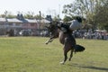 Gaucho cowboy Vaquero at a rodeo riding a horse at a show in Argentina