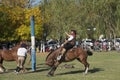 Gaucho cowboy Vaquero at a rodeo riding a horse at a show in Argentina