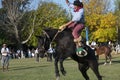 Gaucho cowboy Vaquero at a rodeo riding a horse at a show in Argentina Royalty Free Stock Photo