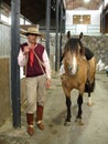 Gaucho with his horse with the characteristic clothing in Argentina