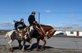 The Gauchos are riding along the road in Rio Grande. Royalty Free Stock Photo