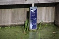 Gaude rod in the water in centimetres indicates the water level. On this Rod the water level is 5.90 metres below sealevel in the