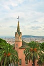 Gaudi house with tower in Park Guell, Barcelona