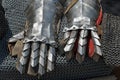 Gauntlets on mail background