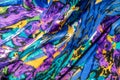 Texture, fabric, background. Women's scarf. Silk fabric is blue,