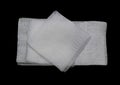 Gauze pads on the black background Royalty Free Stock Photo