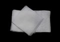 Gauze pads on the black background Royalty Free Stock Photo