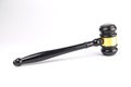 Gavel black handle, gold accents on surface, symbolizing law or auction, plain background, even lighting. m Royalty Free Stock Photo