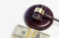 A Gavel block, pile of money Royalty Free Stock Photo