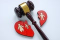 Gavel and broken heart as a symbol of divorce, alimony and custody.