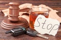 Gavel, car keys, glass of alcohol. Royalty Free Stock Photo