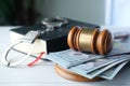 gavel, cash and handcuff on table, close up Royalty Free Stock Photo