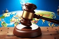 A gavel clutched against a globe backdrop, symbolizing the rule of law