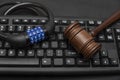 Gavel with combination lock on computer keyboard. Data Protection Concept