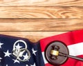 Gavel, handcuffs and american flag on wooden background. Top view. Space for text Royalty Free Stock Photo