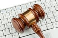 Gavel on keyboard Royalty Free Stock Photo