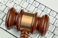 Gavel on keyboard Royalty Free Stock Photo