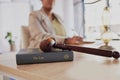 Gavel, law firm and books on table of attorney in office for judge, justice and court trial. Closeup of advocate, lawyer Royalty Free Stock Photo