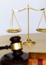 Gavel and legal Judge gavel scales of justice and law working on Royalty Free Stock Photo