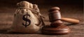 The gavel and money bag symbolizing justice and financial matters. AI generated image Royalty Free Stock Photo