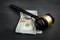 Gavel and money in the court. Penalty or bribe Royalty Free Stock Photo