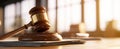 The gavel resting on documents in a modern legal office setting. AI generated image Royalty Free Stock Photo