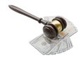 Gavel Resting on Stacks of Thousands of Dollars Isolated on a White Background