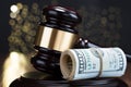 Gavel With Rolled Banknote Royalty Free Stock Photo