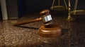 Gavel, scales of justice and law books on marble Royalty Free Stock Photo