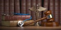 Gavel, stethoscope and caduceus sign on books background. Mediicine laws and legal, medical jurisprudence. Royalty Free Stock Photo