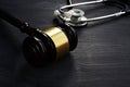 Gavel and stethoscope. Medical negligence concept. Royalty Free Stock Photo