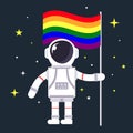 Gay astronaut holding LGBT flag in hand isolated on black background with stars Royalty Free Stock Photo