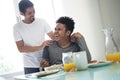 Gay Couple Eating Breakfast At Home In the Morning Royalty Free Stock Photo