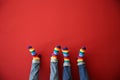 Gay couple with rainbow socks on color background Royalty Free Stock Photo