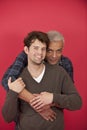 Gay couple on red background