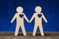 Gay couple. Two figures of men hold hands Royalty Free Stock Photo