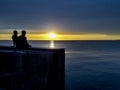 Gay Couple Watching Sunset, Montevideo, Uruguay Royalty Free Stock Photo