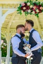 Gay couple wedding. Homosexuality, same-sex marriage and men love concept. Gays kissing. Gay marriage, closeup male kiss Royalty Free Stock Photo