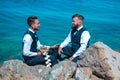 Gay couple wedding. Lgbt gay marriage couple having romantic moment together after wedding ceremony. Concept of LGBTQ Royalty Free Stock Photo