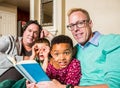 Gay Family Reading Together